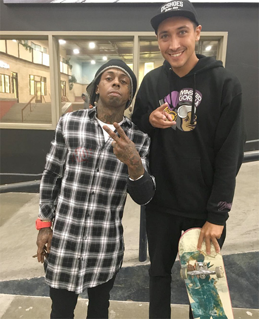 lil-wayne-i-am-not-a-human-being-2-skating-trukstop-crosses-out-cmb-on-ymcmb-banner.jpg